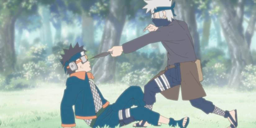 Naruto Shippuden's young Kakashi holds young Obito at kunai point in the forest.