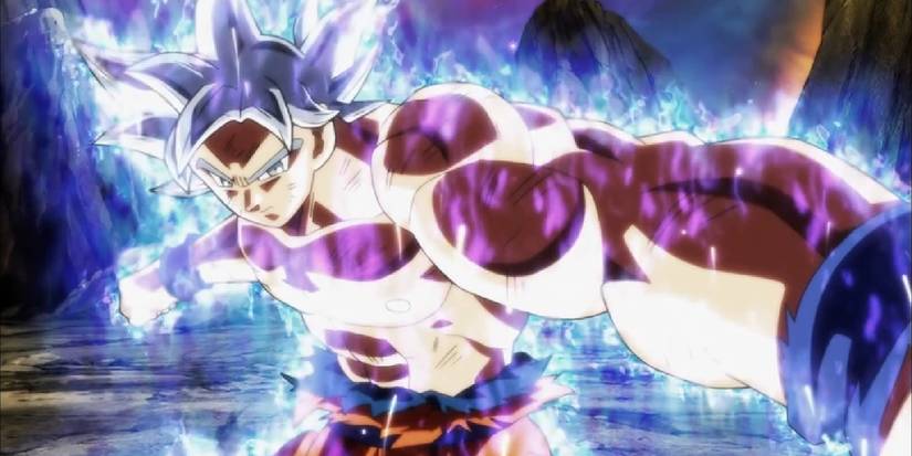 Perfected Ultra Instinct Goku reels back to deliver a big punch to Jiren in Dragon Ball Super.