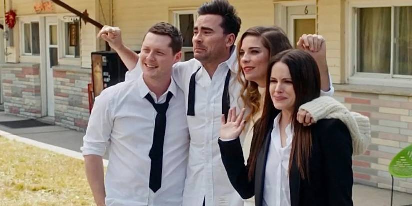 Characters put their arms around each other, cry, and wave goodbye in the finale of Schitt's Creek