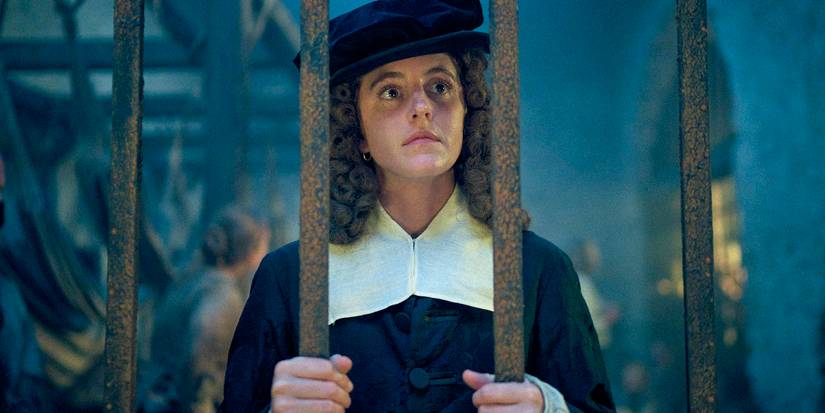 Nell Jackson (Louisa Harland) observing from behind bars in Renegade Nell season 1 