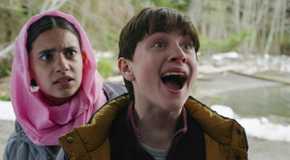 Max Hawthorne looking very scared with Sahar in the back looking worried in Resident Alien season 3 episode 8