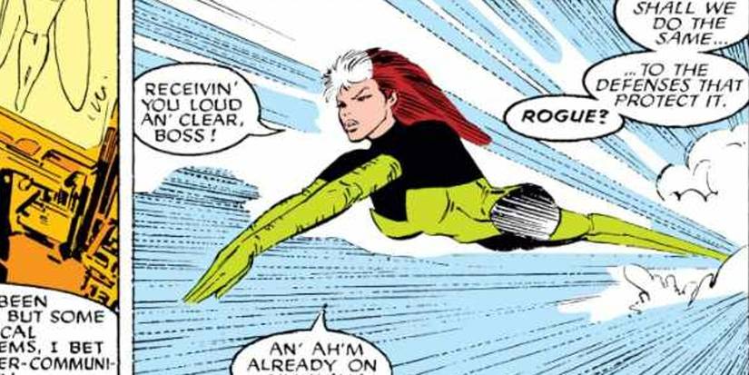 Rogue flying in her green and black jumpsuit