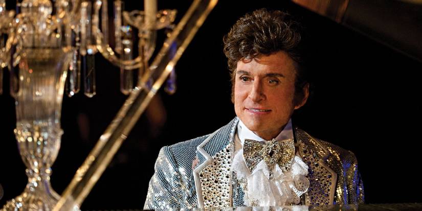 Michael Douglas plays the piano as Liberace in Behind the Candelabra