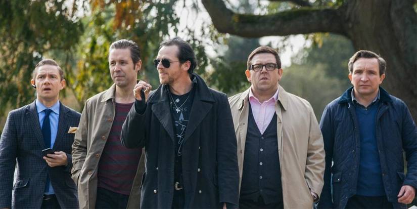 Simon Pegg, Nick Frost, Martin Freeman, Eddie Marsan, and Paddy Considine walking in a line in The World's End