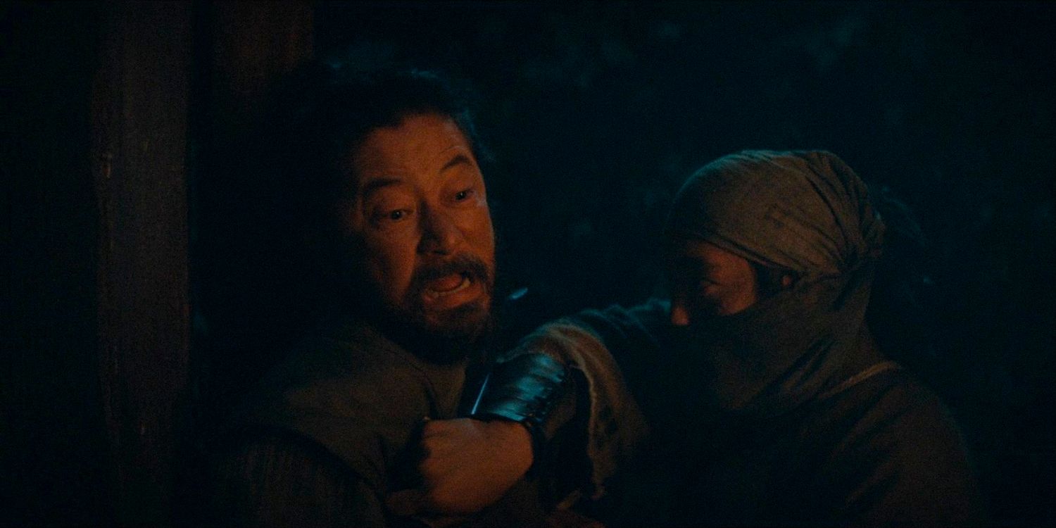 Yabushige is threatened with a weapon at his neck by a shinobi in Shogun season 1 Ep 9 