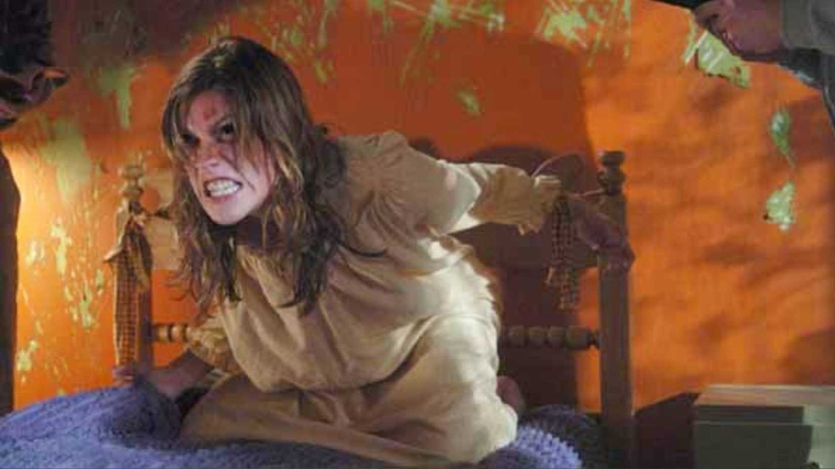 Emily Rose grimacing tied to a bed in The Exorcism Of Emily Rose