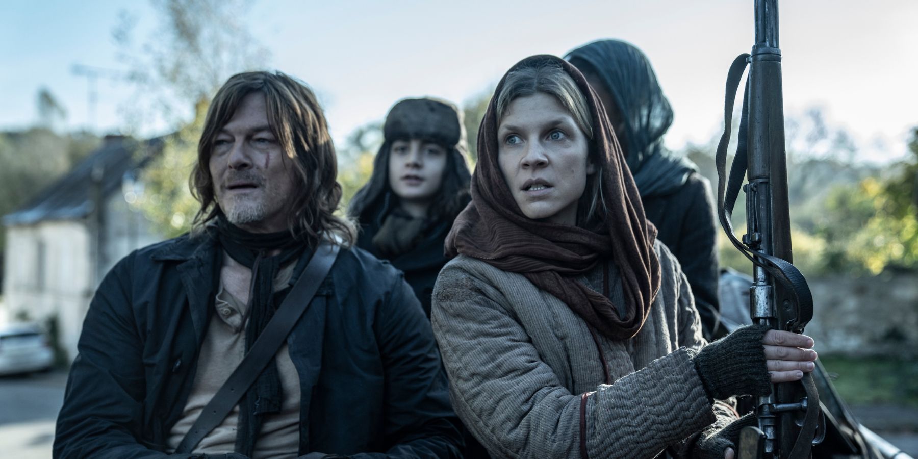 Daryl Dixon (Norman Reedus), Isabelle Carriere (Clémence Poésy), and Laurent Carriere (Louis Puech Scigliuzzi) avoid variant walkers on The Walking Dead: Daryl Dixon