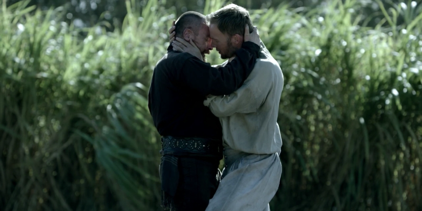 Captain Flint and Thomas Hamilton share a passionate embrace in Black Sails