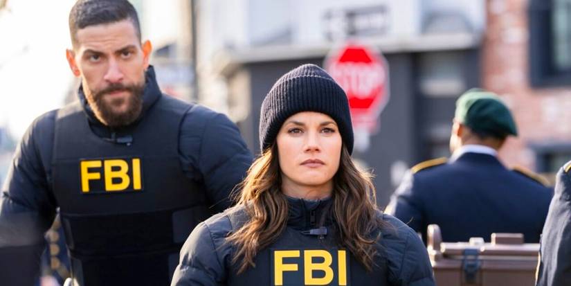 Maggie and OA looking focused while walking at a crime scene in FBI season 6