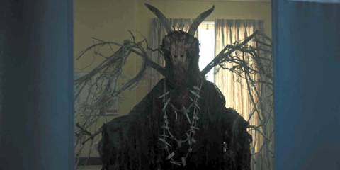 The Gargoyle King lurking in a doorway in Riverdale season 3