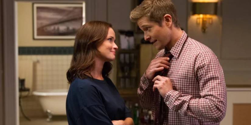 Rory and Logan smiling at each other after sleeping together in Gilmore Girls: A Year in the Life