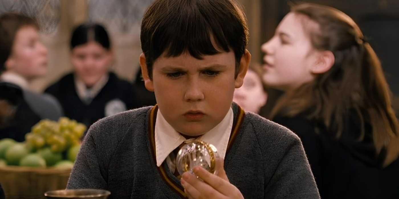 Neville looking at the remembrall from his grandmother in Harry Potter and the Philosophers Stone.