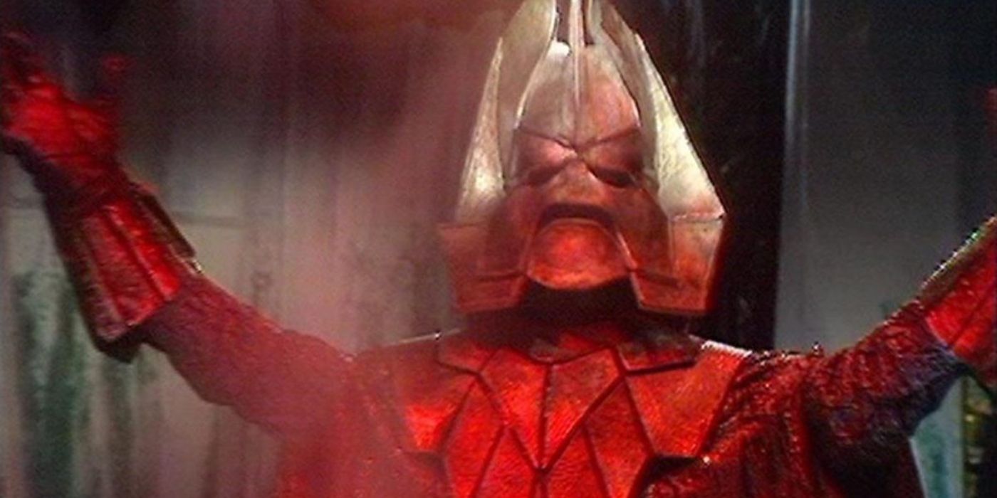The villain Omega surrounded by red smoke in Doctor Who