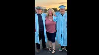 1000-lb Sisters Amanda Halterman & 2 sons at a high school graduation, and her sons are wearing blue caps and gowns