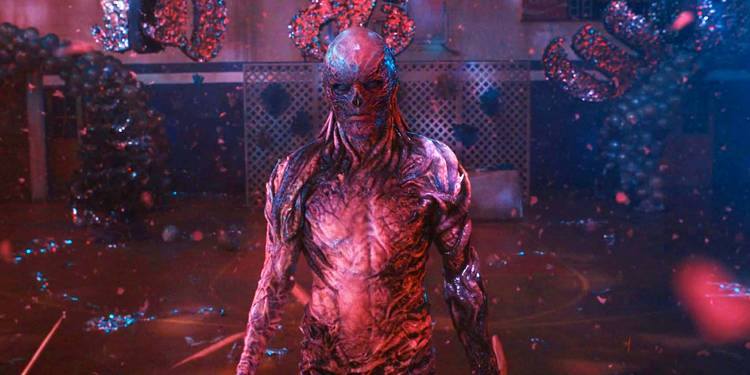 Vecna (Jamie Campbell Bower) standing menacingly in the Stranger Things season 4 finale