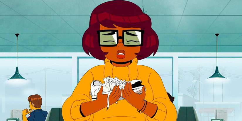 Velma cries while holding a destroyed sneaker in Velma season 2 ep 1