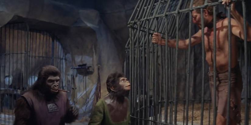 Lou Wagner as Lucius helps Charlton Heston as George Taylor escape in Planet of the Apes (1968)