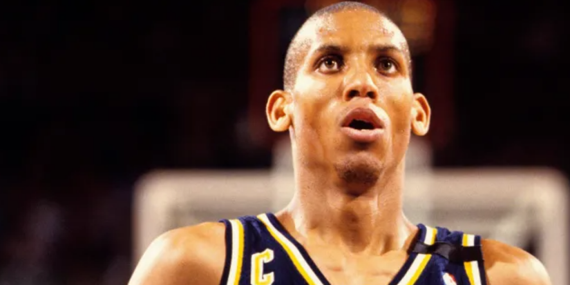 A closeup of Reggie Miller looking stressed on the basketball court in ESPN's 30 for 30