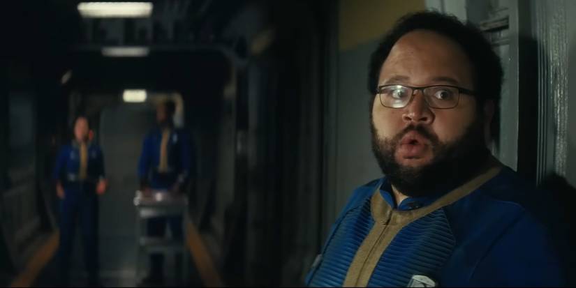 Zach Cherry dans le rôle de Woody Thomas dans Fallout