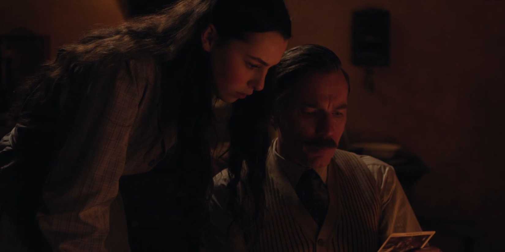 Sofia and Alexander reading something together in A Gentleman in Moscow