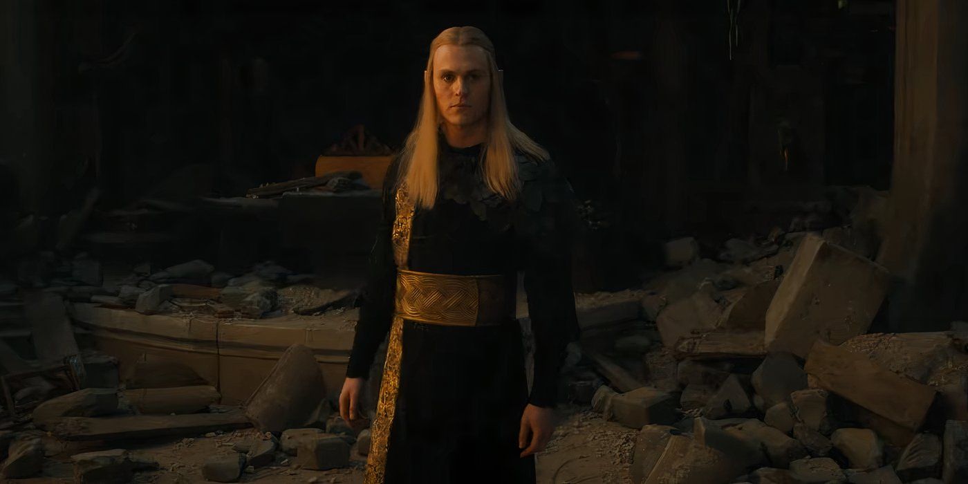 Charlie Vickers as Sauron or Annatar standing in rubble in the Rings of Power season 2 trailer.