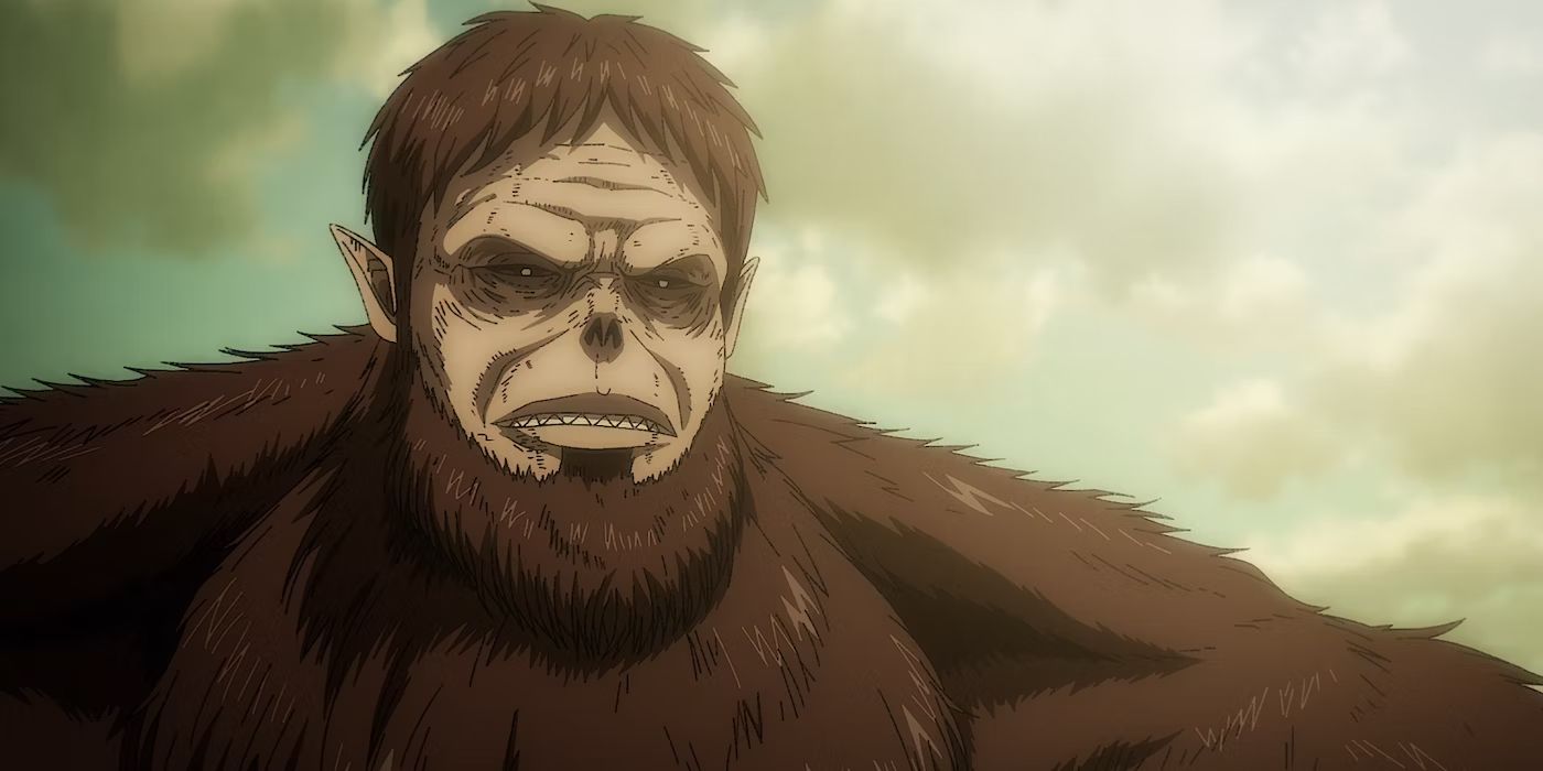 Attack on Titan's Beast Titan looks down in annoyance as a cloudy sky moves behind him.