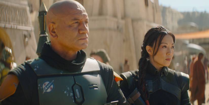 Boba Fett standing next to Fennec Shand in the Book of Boba Fett