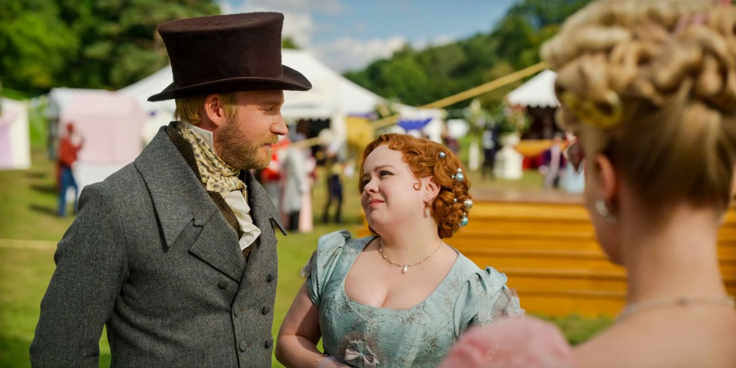 Penelope Featherington (Nicola Coughlan) and Lord Alfred Debling (Sam Phillips) looking into each other's eyes in Bridgerton season 3 Part 1