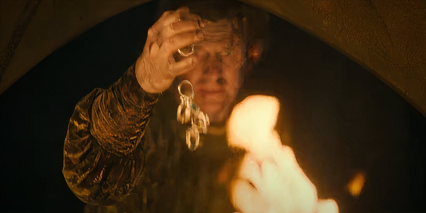 Celebrimbor dropping rings into a fire in the Rings of Power season 2 trailer.