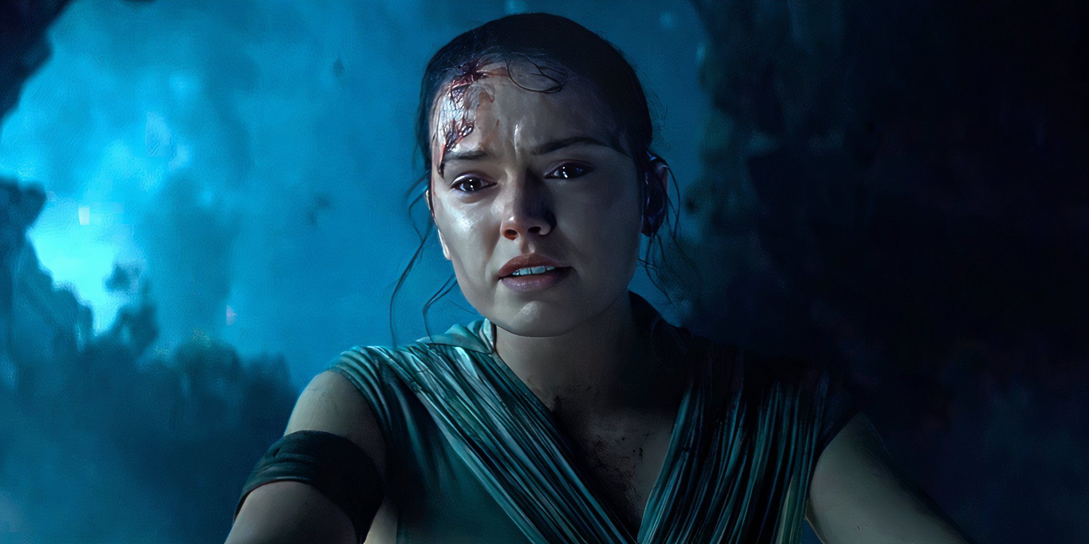 Daisy Ridley as Rey crying over Kylo Ren's body in Star Wars The Rise of Skywalker