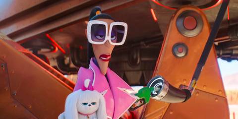 Valentina with her dog as she fills up her vehicle in Despicable Me 4