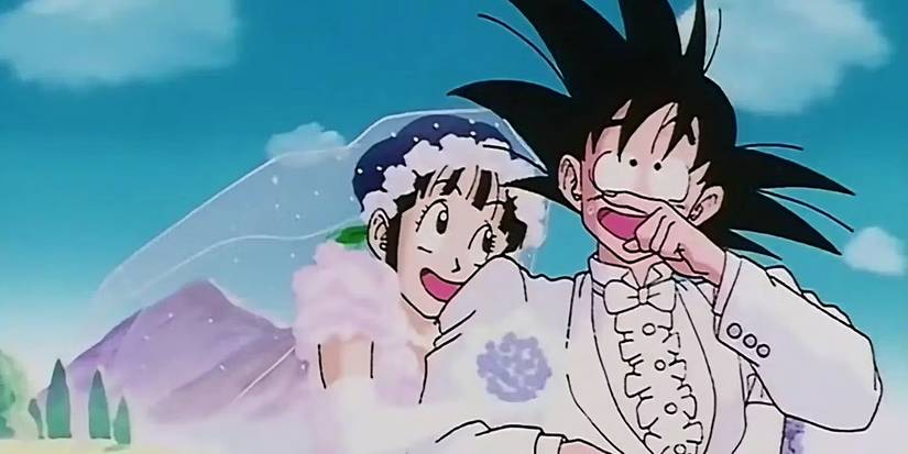 Goku and Chi Chi elated after their wedding with both dressed up in fancy attire.