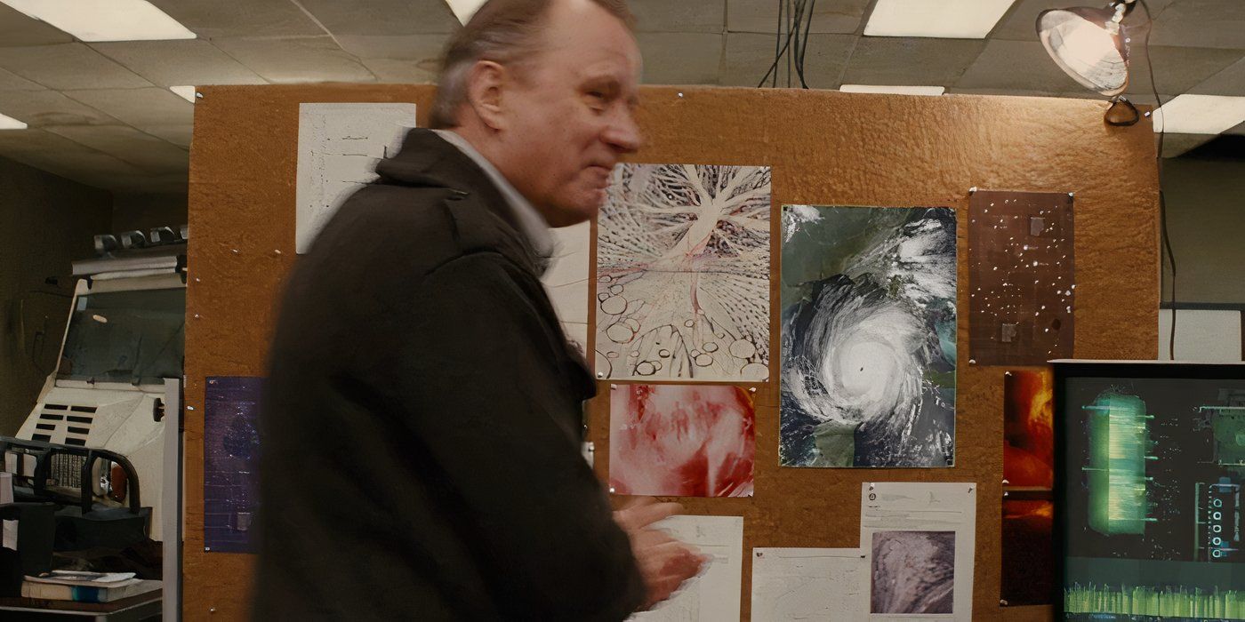 Erik Selvig looks pleased in front of a pinboard in Thor 2011 deleted scene