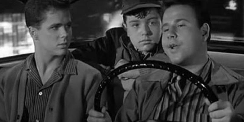 Lumpy driving a car with Beaver and Wally in Leave it to Beaver.