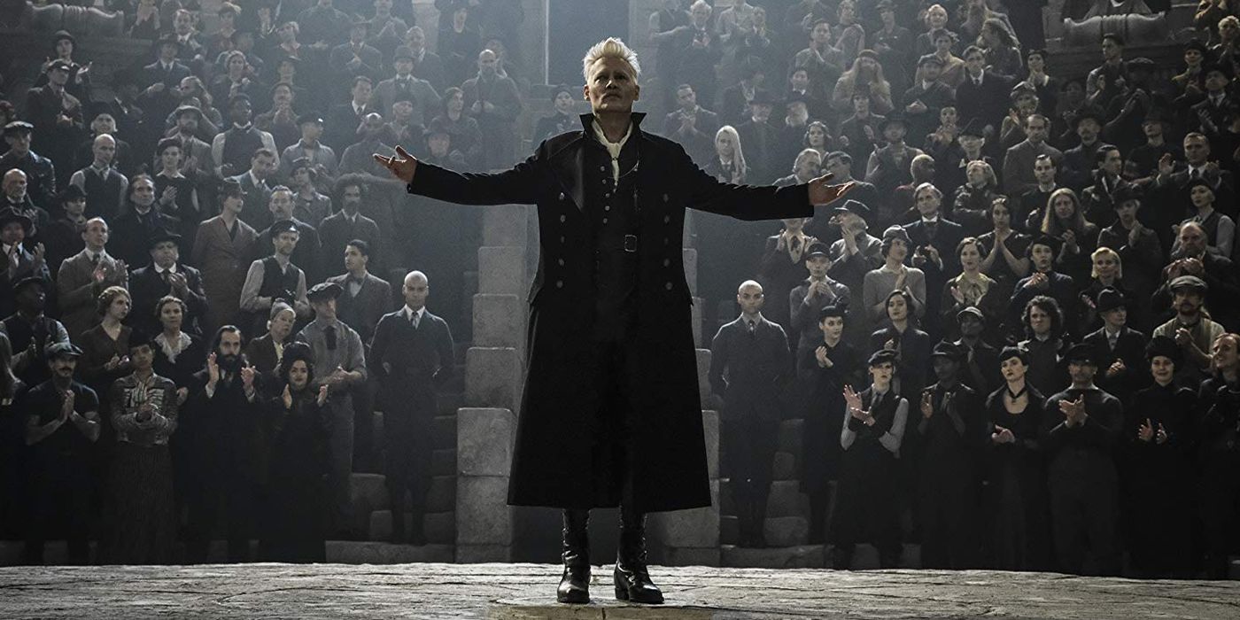 Johnny Depp looking victorious as Gellert Grindelwald in Fantastic Beasts 2