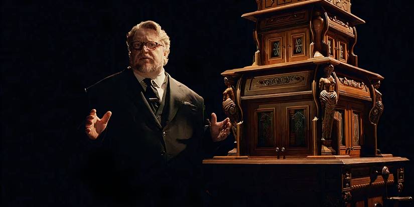 10 Horror TV Shows & Movies To Watch After Something Very Bad Is Going To Happen 6 Guillermo del Toro doing an intro segment next to a model in Netflix's Cabinet of Curiosities