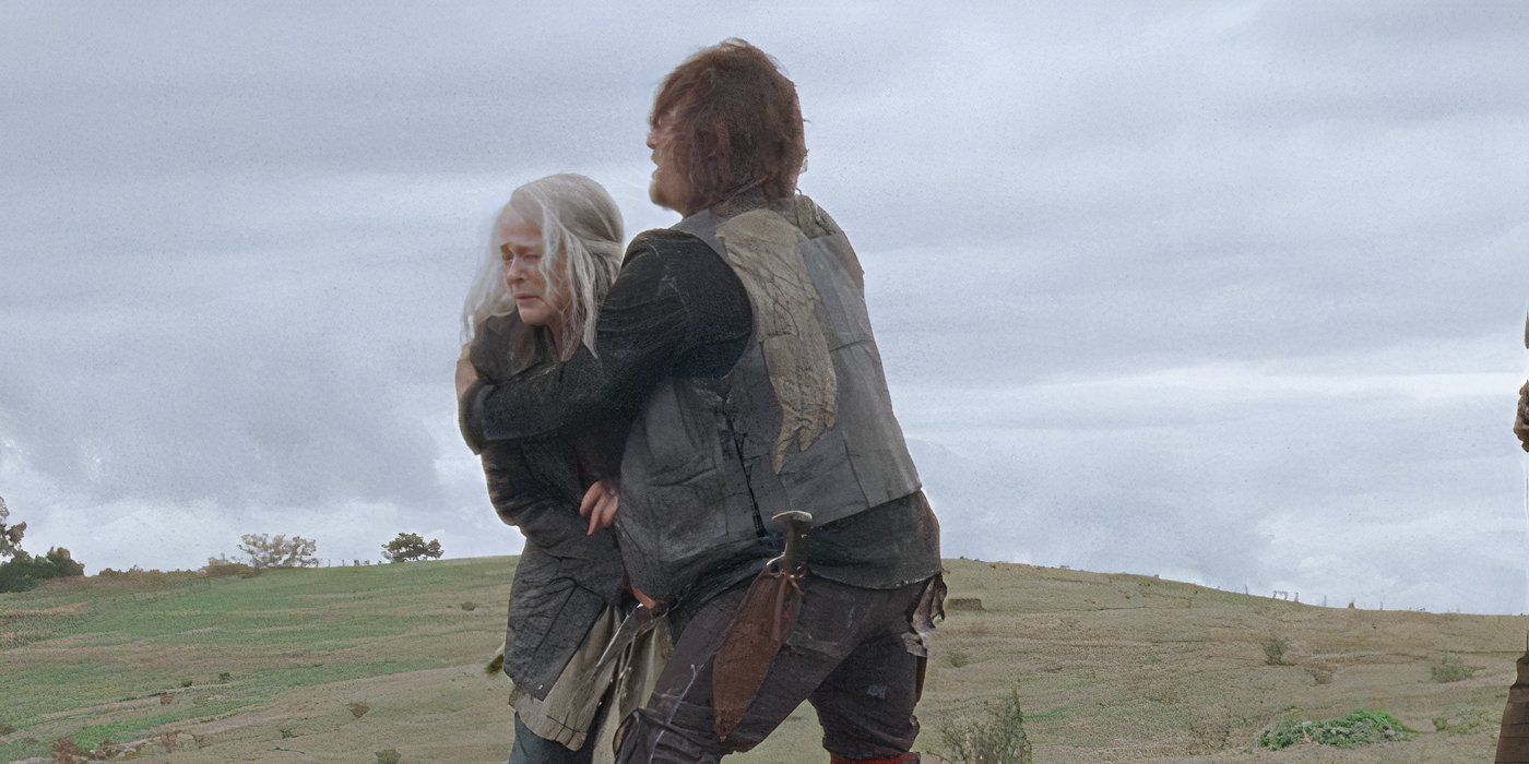 Daryl (Norman Reedus) consoles Carol (Melissa McBride) on The Walking Dead