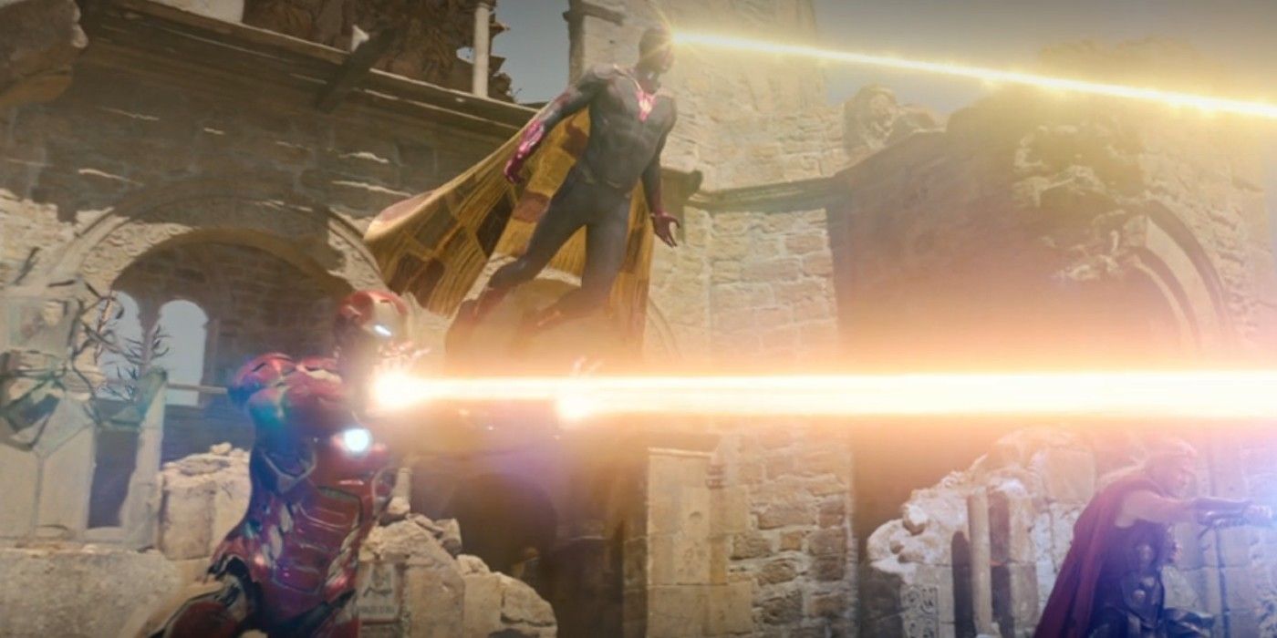 Iron Man, Vision, and Thor shoot blasts at Ultron in Avengers Age of Ultron