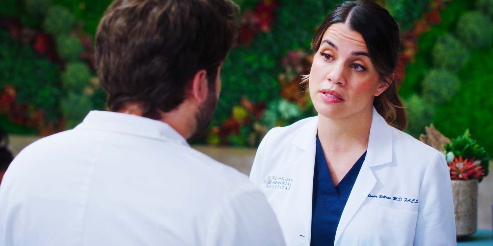 Jake Borelli as Levi Schmitt and Natalie Morales as Monica Beltran Conversing in Grey's Anatomy season 20 episode 6