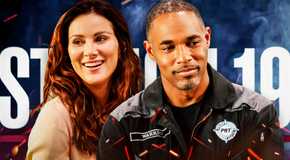 Jason George as Dr. Ben Warren looking content and Stefania Spampinato as Dr. Carina DeLuca smiling in Station 19