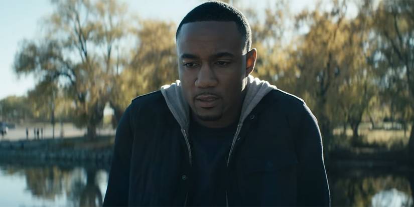 Jessie T. Usher as A-Train looking uncertain in a park in The Boys season 4