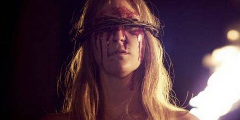 a ritual in Kill List, a woman wears a wicker blindfold and blood drips down her face