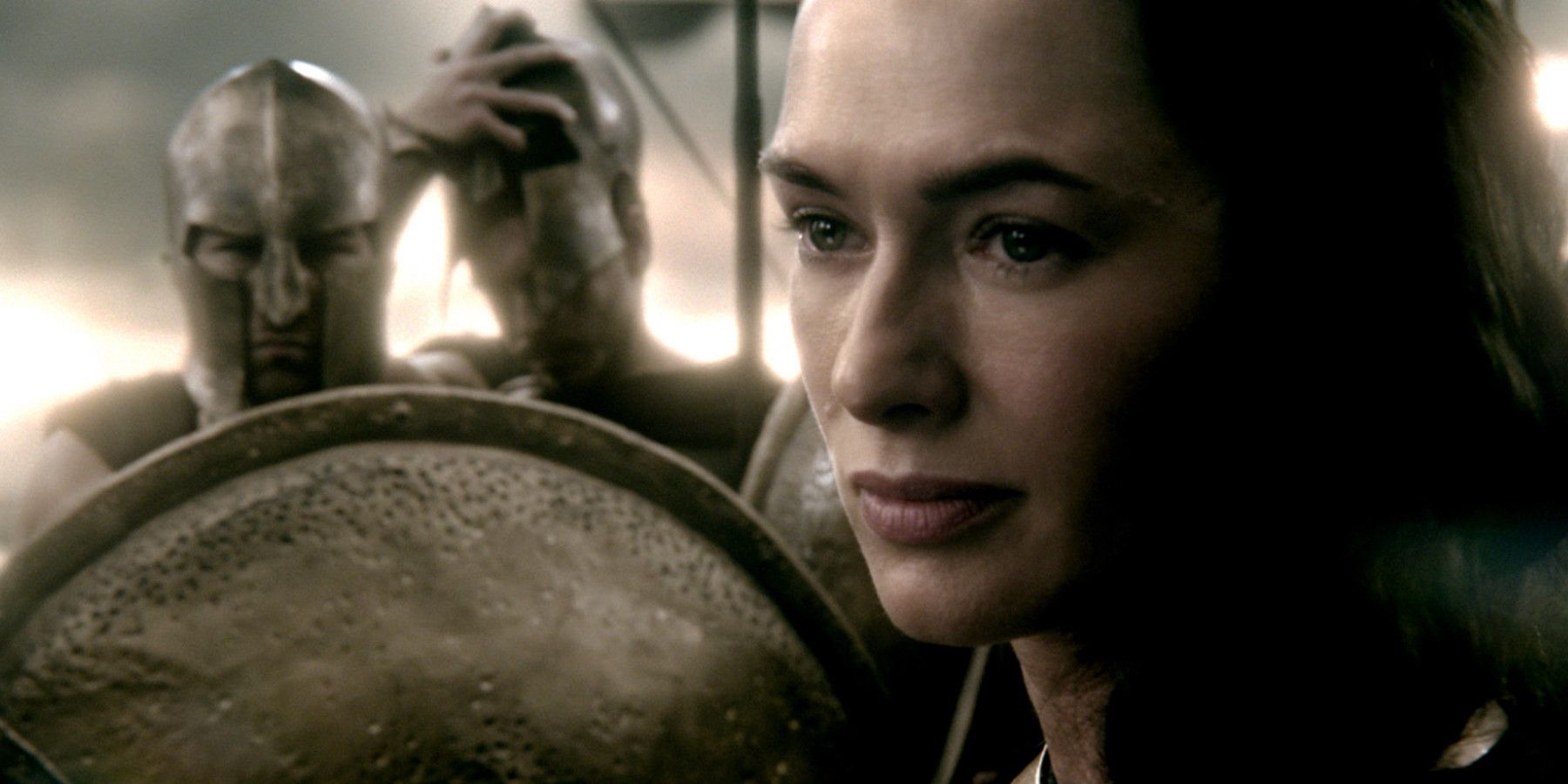 Lena Headey in 300 Rise of an Empire playing Queen Gorgo against a shield background