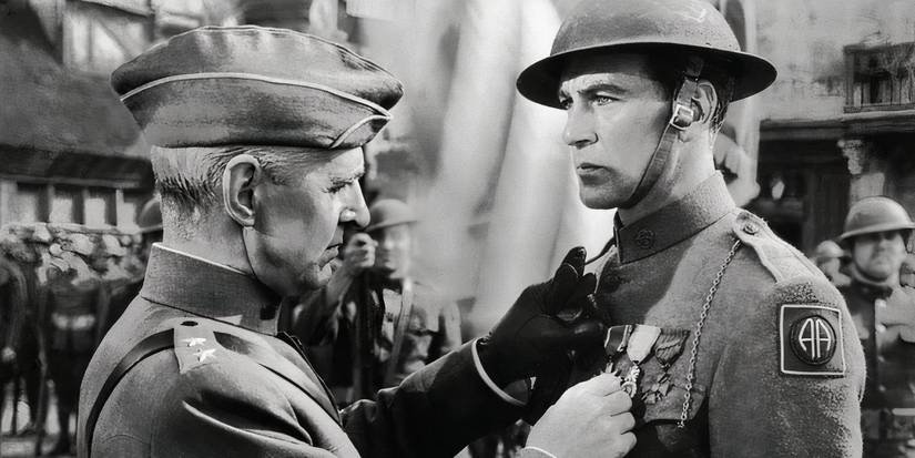 Major Buxton (Stanley Ridges) pinning a medal on Alvin York (Gary Cooper) in Sergeant York.