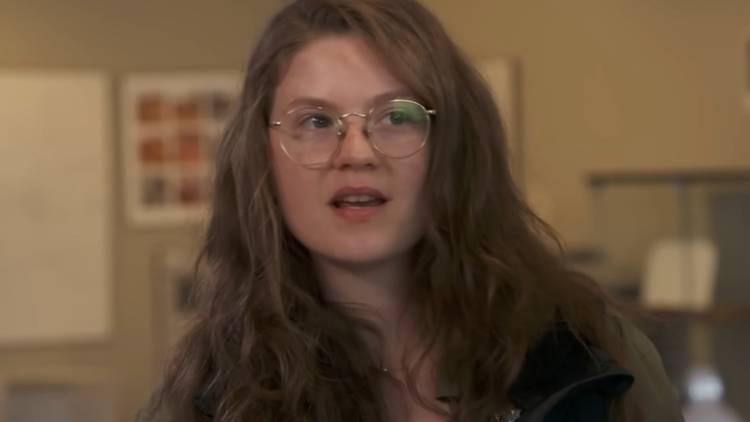 Emma Culligan giving an interview in The Curse of Oak Island