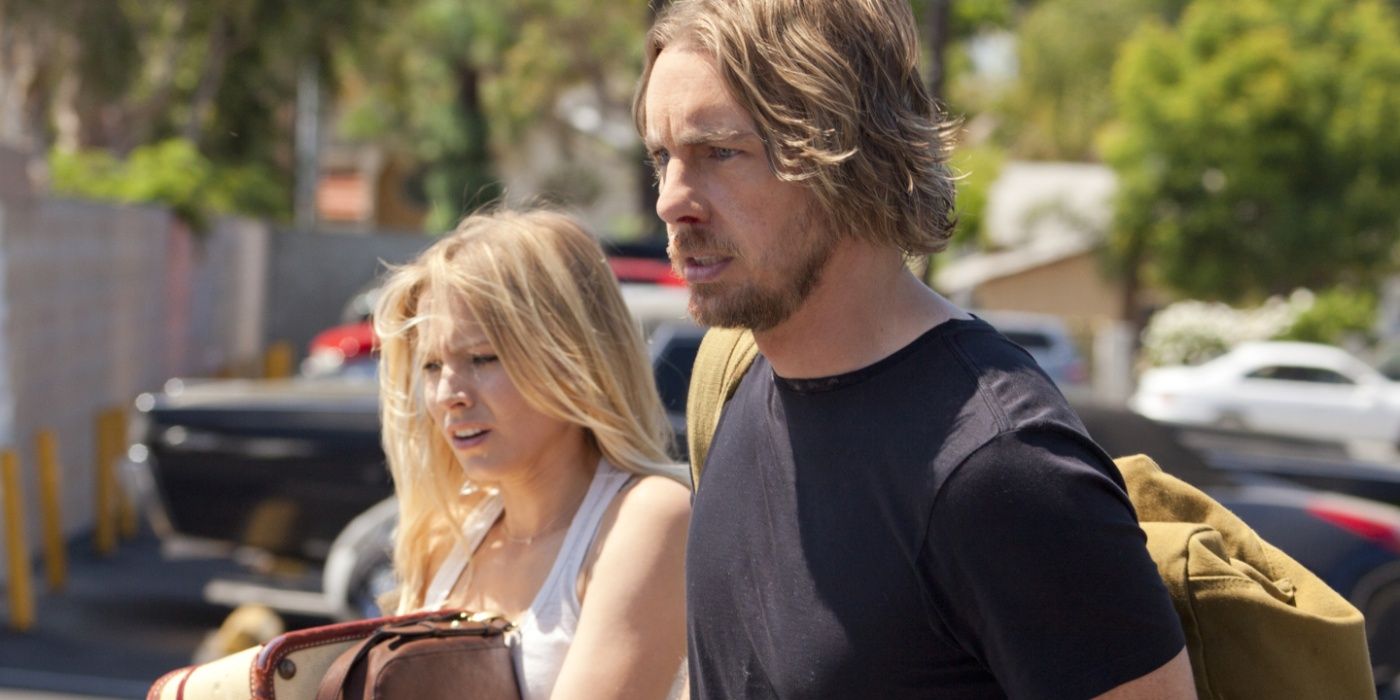 Kristen Bell and Dax Shepard walking through the street in Hit & Run