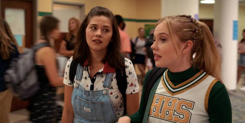 Molly Brown walking with a cheerleader in Senior Year