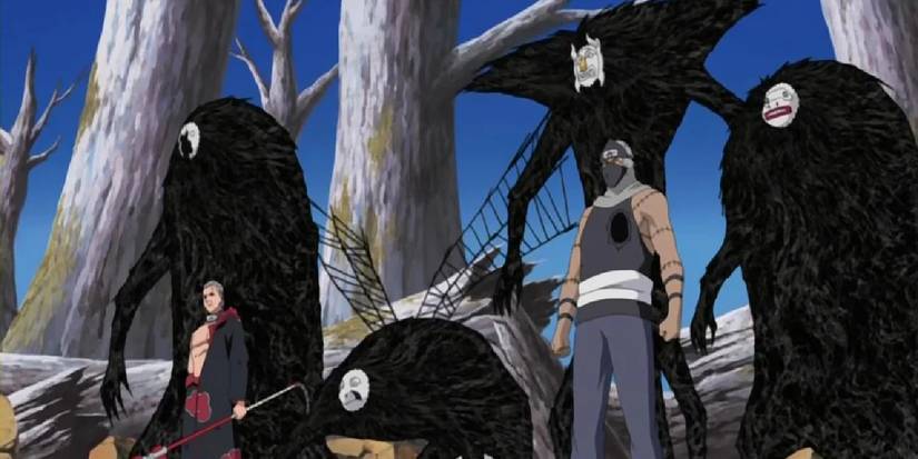 Naruto's Hidan and Kakuzu stand in front of Kakuzu's four cores which are all separated from his body.