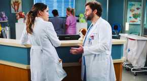 Natalie Morales as Monica Beltran and Jake Borelli as Levi Schmitt in Grey's Anatomy season 20 episode 6