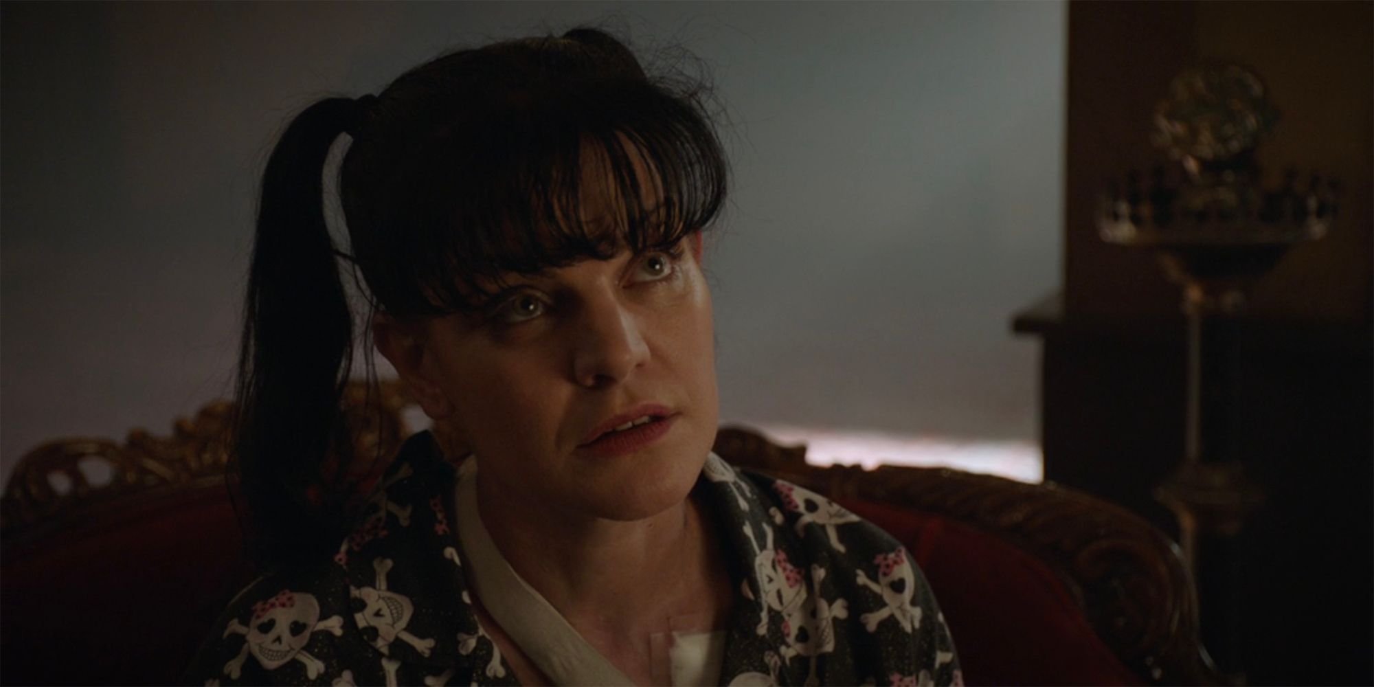 A close up of Abby Sciuto looking upward in NCIS